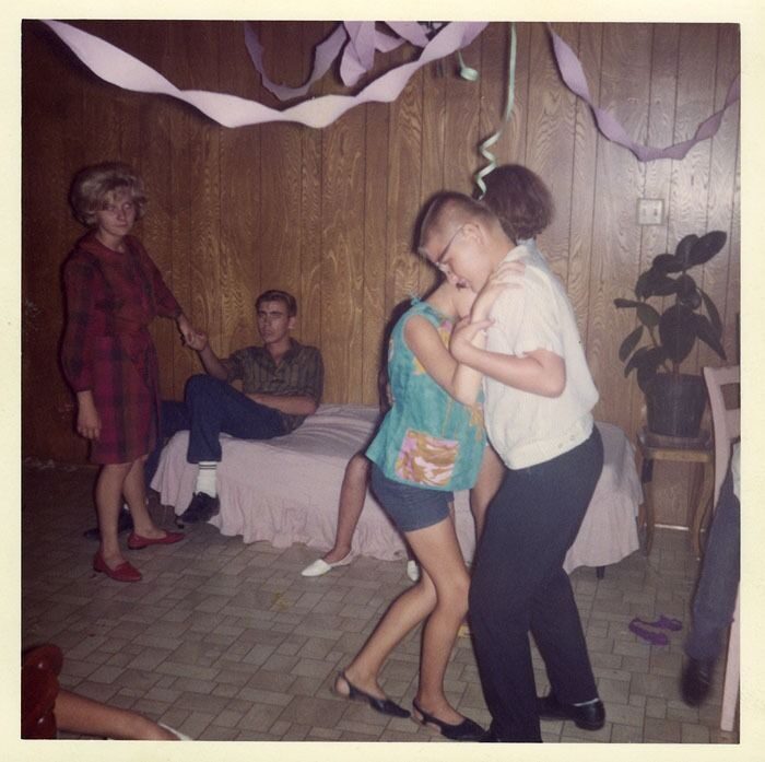 Vintage family photo: teenagers dancing at a party with paper streamers